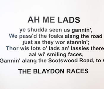 A sign with the lyrics to The Blaydon Races