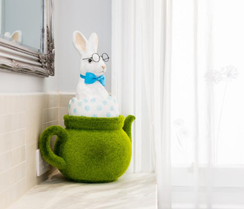 A rabbit ornament in a teapot at Through the Looking Glass