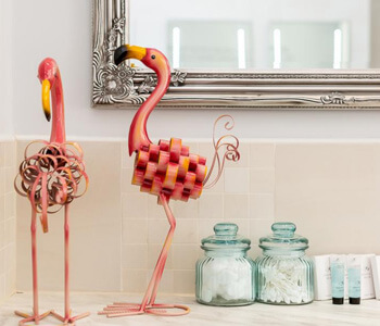 A close up of ornaments in the bathroom at Through the Looking Glass